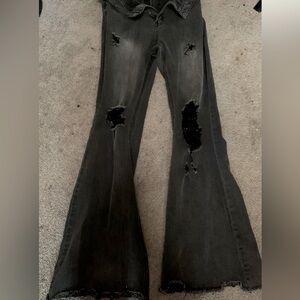 Forever 21 women’s black ripped, flare jeans